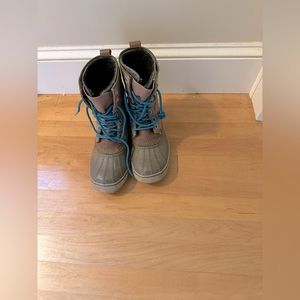 SOREL waterproof winter boots with bright blue laces